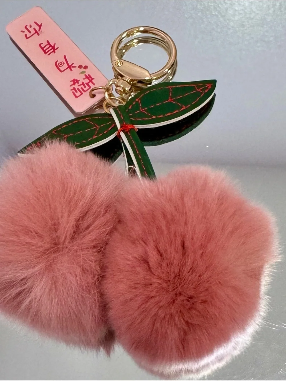 New Pink Faux Fur Pom Pom Cherry Keychain with Green Leaf Accent